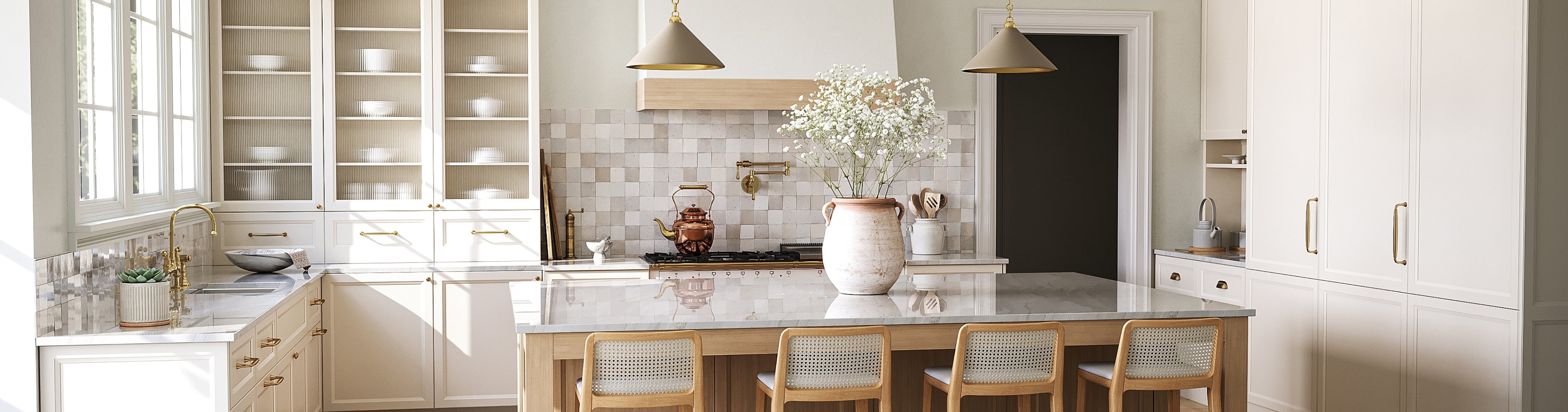 Modern kitchen with white cabinets, marble countertops, and decorative elements.